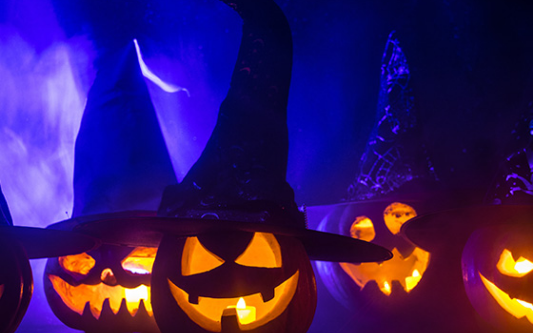 Glowing Jack-o-lanterns on a dark night